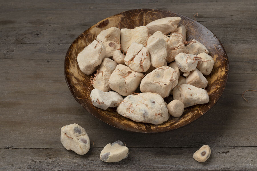 Dried baobab fruit pulp in a coconut bowl