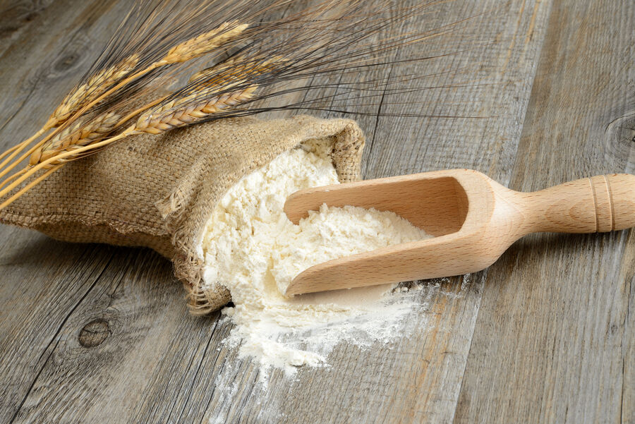 Sack of wheat flour with grain ears